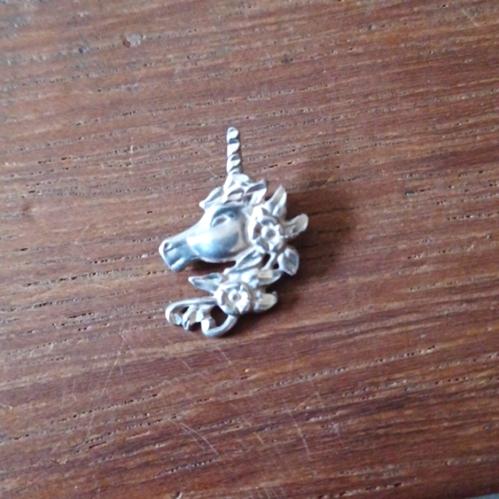 Vintage sterling silver unicorn pendant with flowers in hair